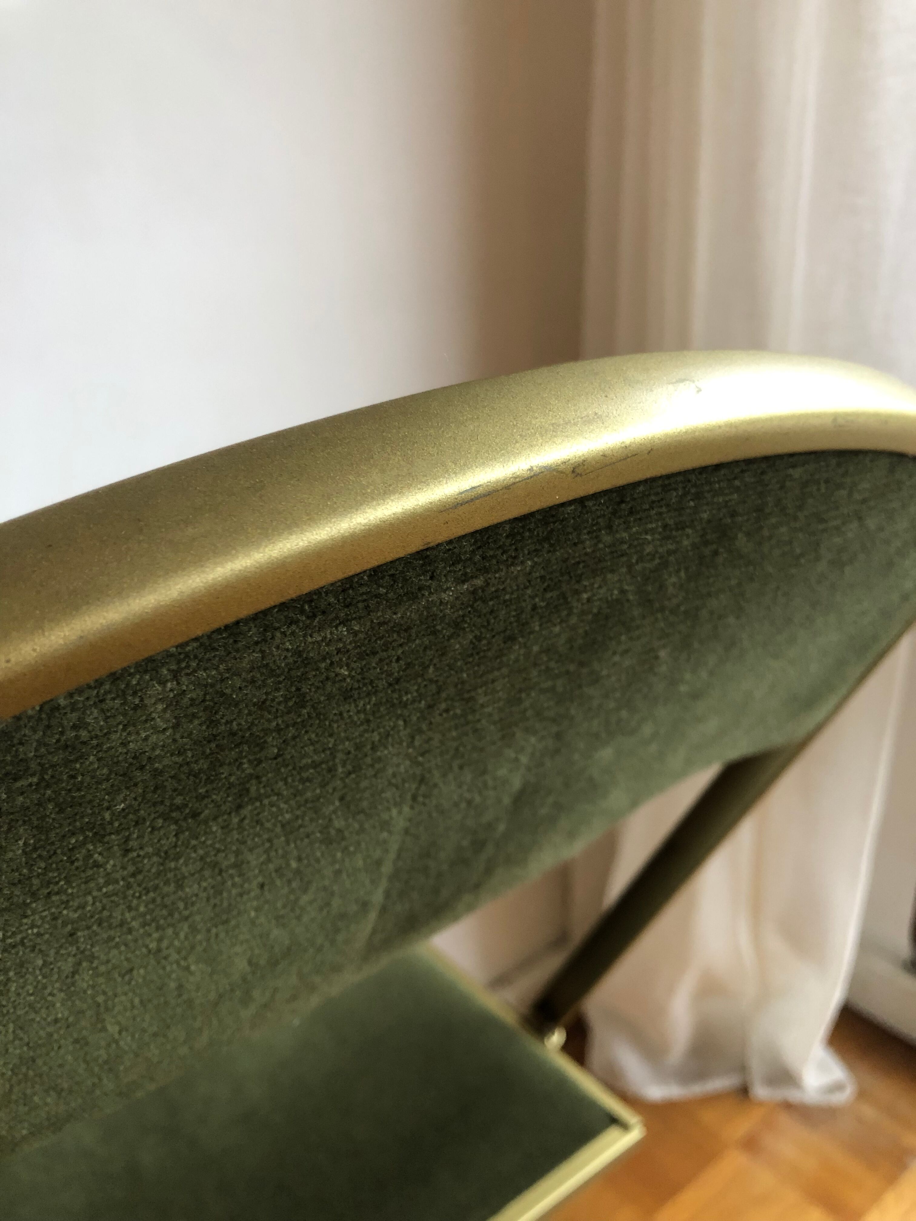 Set of three vintage green folding chairs