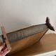 Vintage magazine rack from the 1950s, leather, brass, wood.