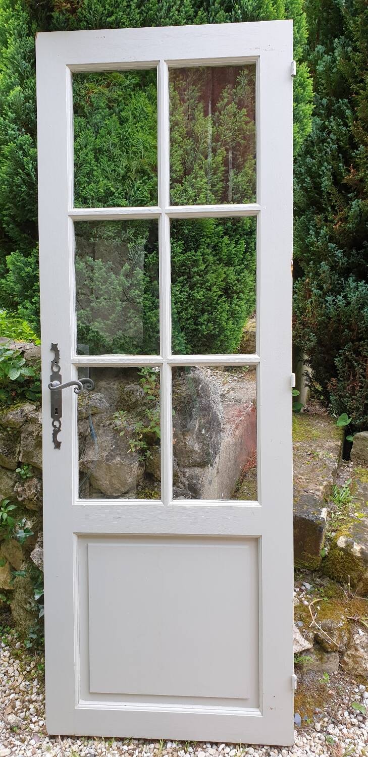 Old wooden door with small squares