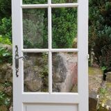 Old wooden door with small squares