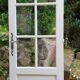 Old wooden door with small squares