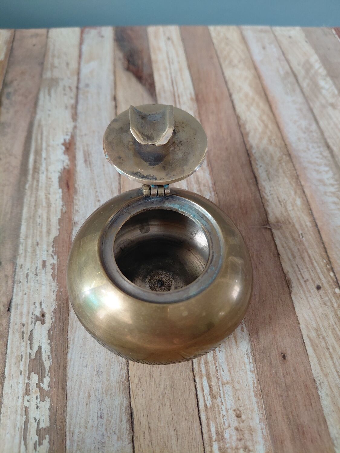 Antique brass pocket ashtray