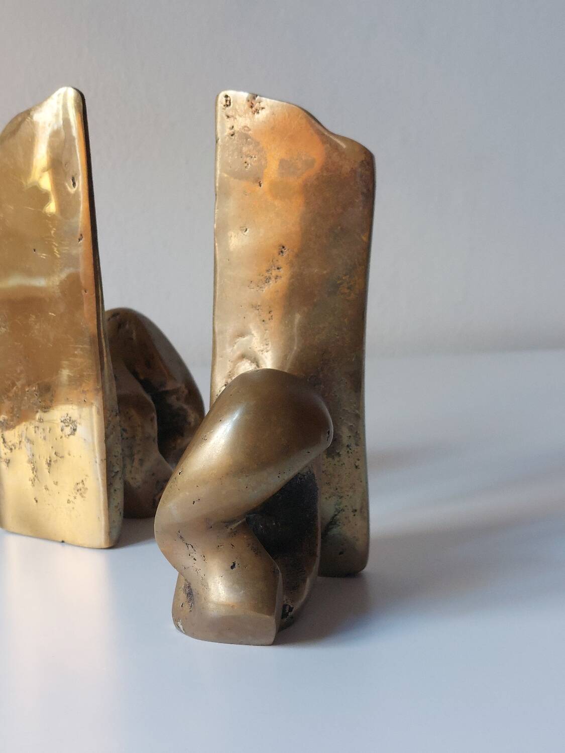 Super rare pair of brutalist brass bookends by David Marshall.