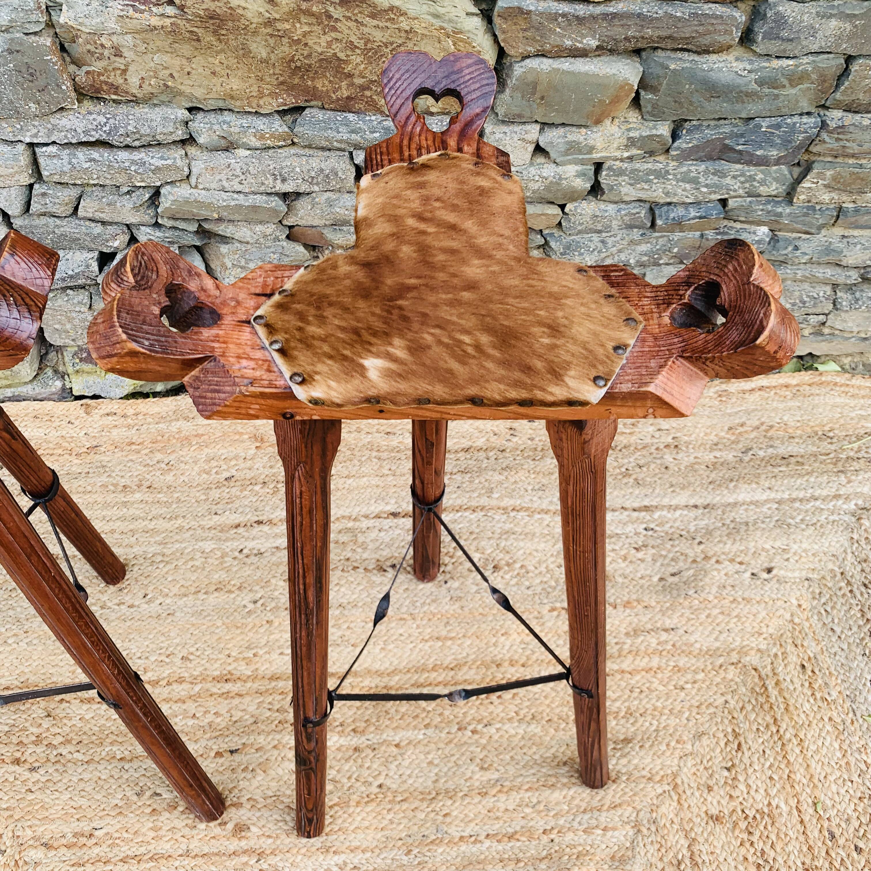 Set of 2 vintage high stools in cowhide and wood