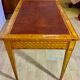 Louis XVI style desk in precious wood marquetry and gilded bronzes