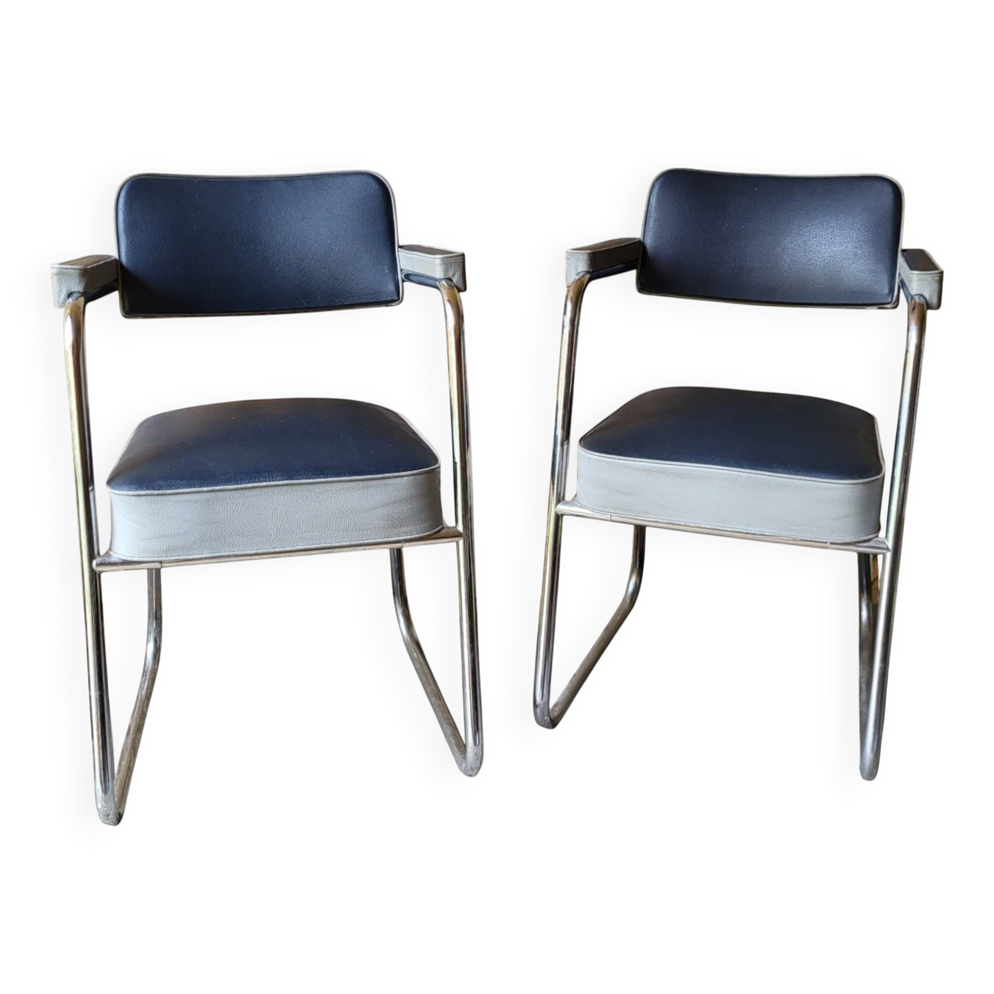 2 armchairs from the 1950s in the Ronéo style of Pullman.