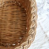 Vintage oval woven wicker basket with thick braided edge
