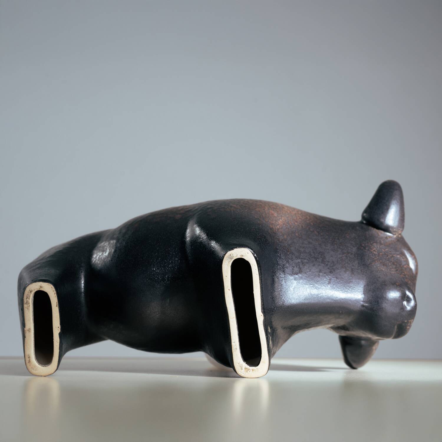Brown glazed bull sculpture by Ed Ruscha, 1970s ceramic art