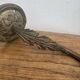 Antique bronze wall light in Louis XVI style - tulip-shaped glass paste flower.