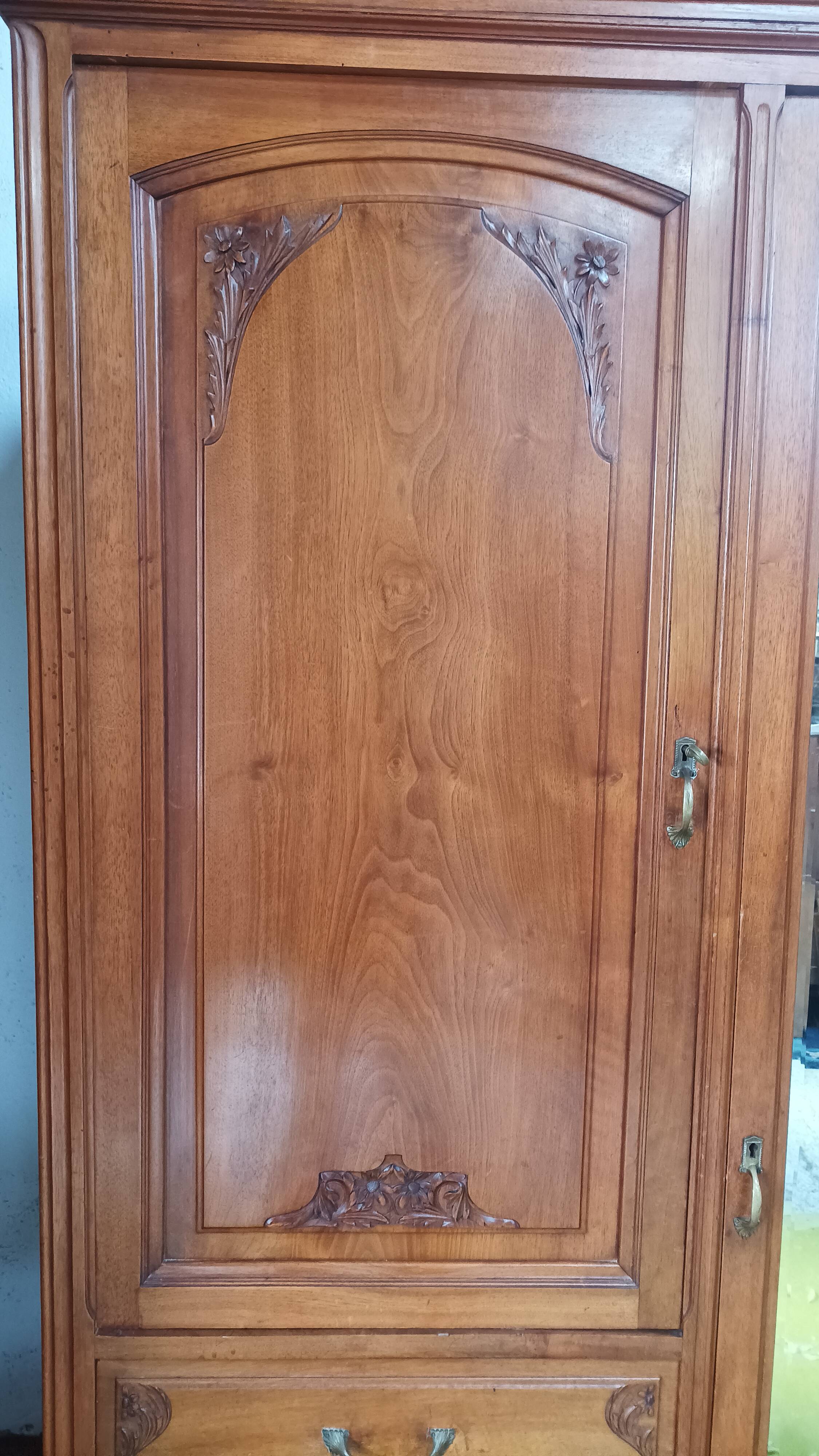 Art Nouveau carved walnut cabinet