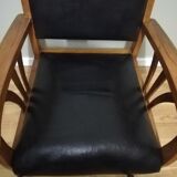 Colonial armchair in teak and black leather