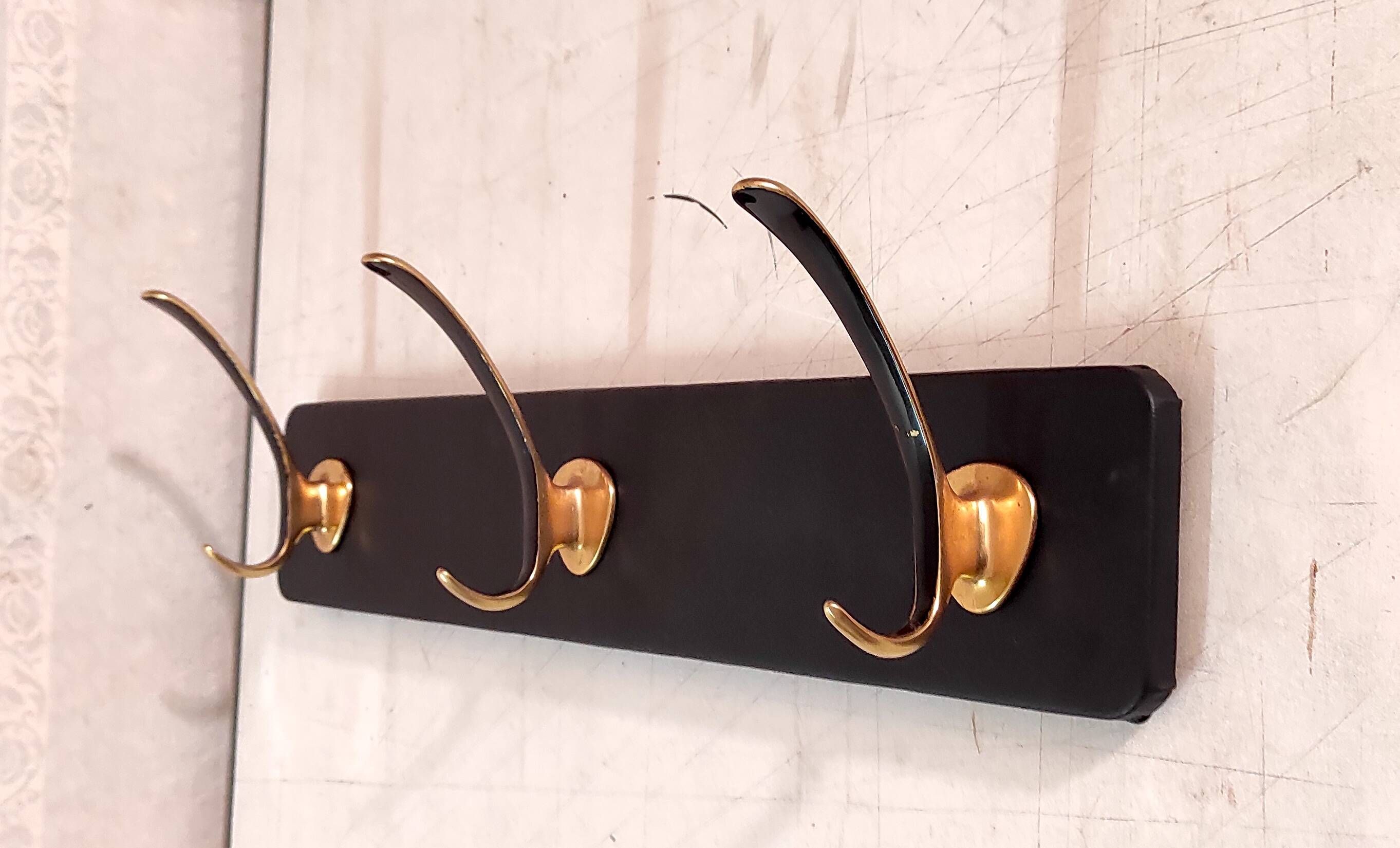 Wall-mounted coat rack in brass, 1950s-60s