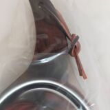 Picks up new vintage shovel and sweeper crumbs