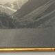 Photo in black and white mountain lake in golden frame