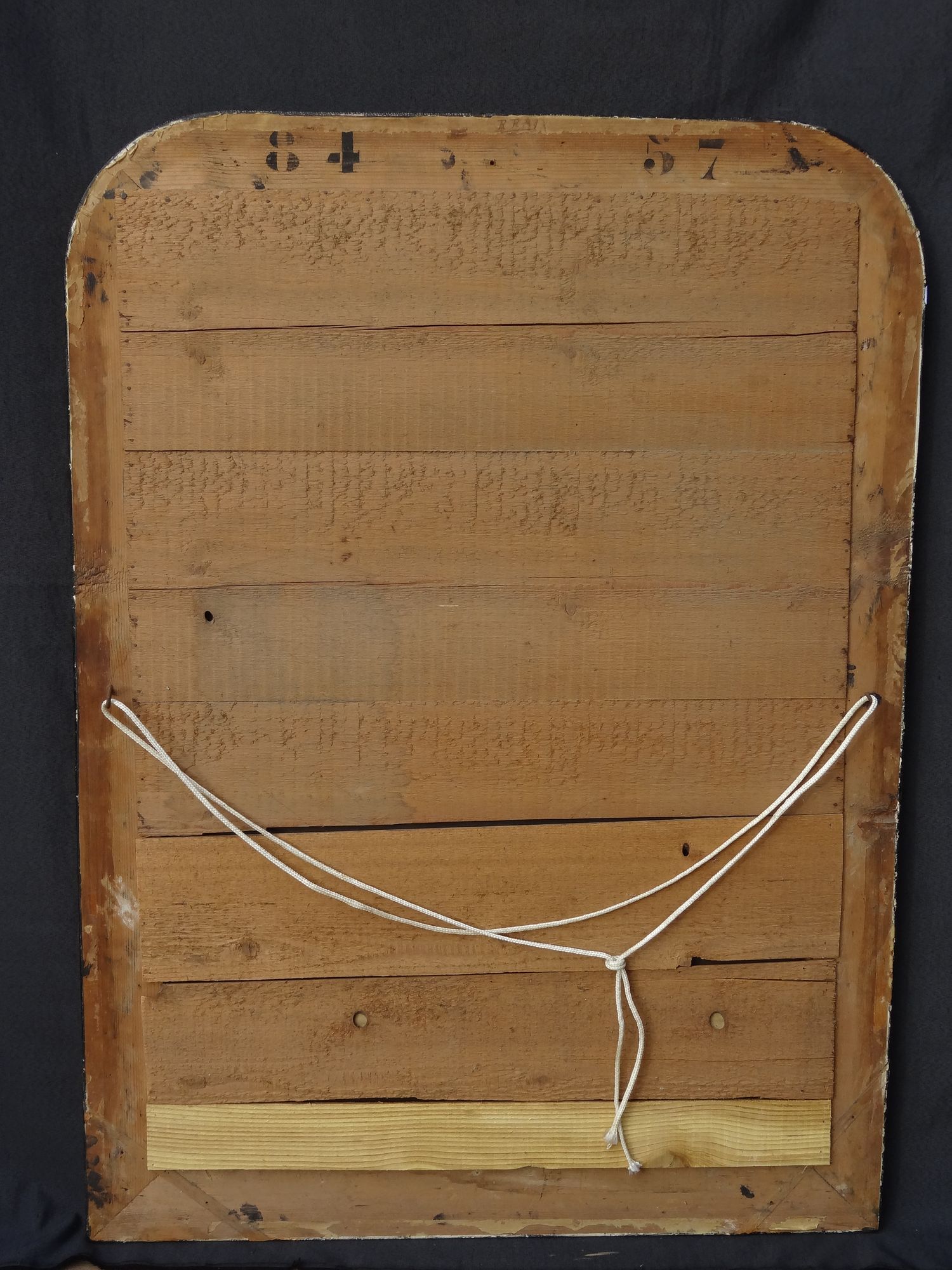 Louis Philippe mirror in blackened and gilded wood, 74 x 102 cm