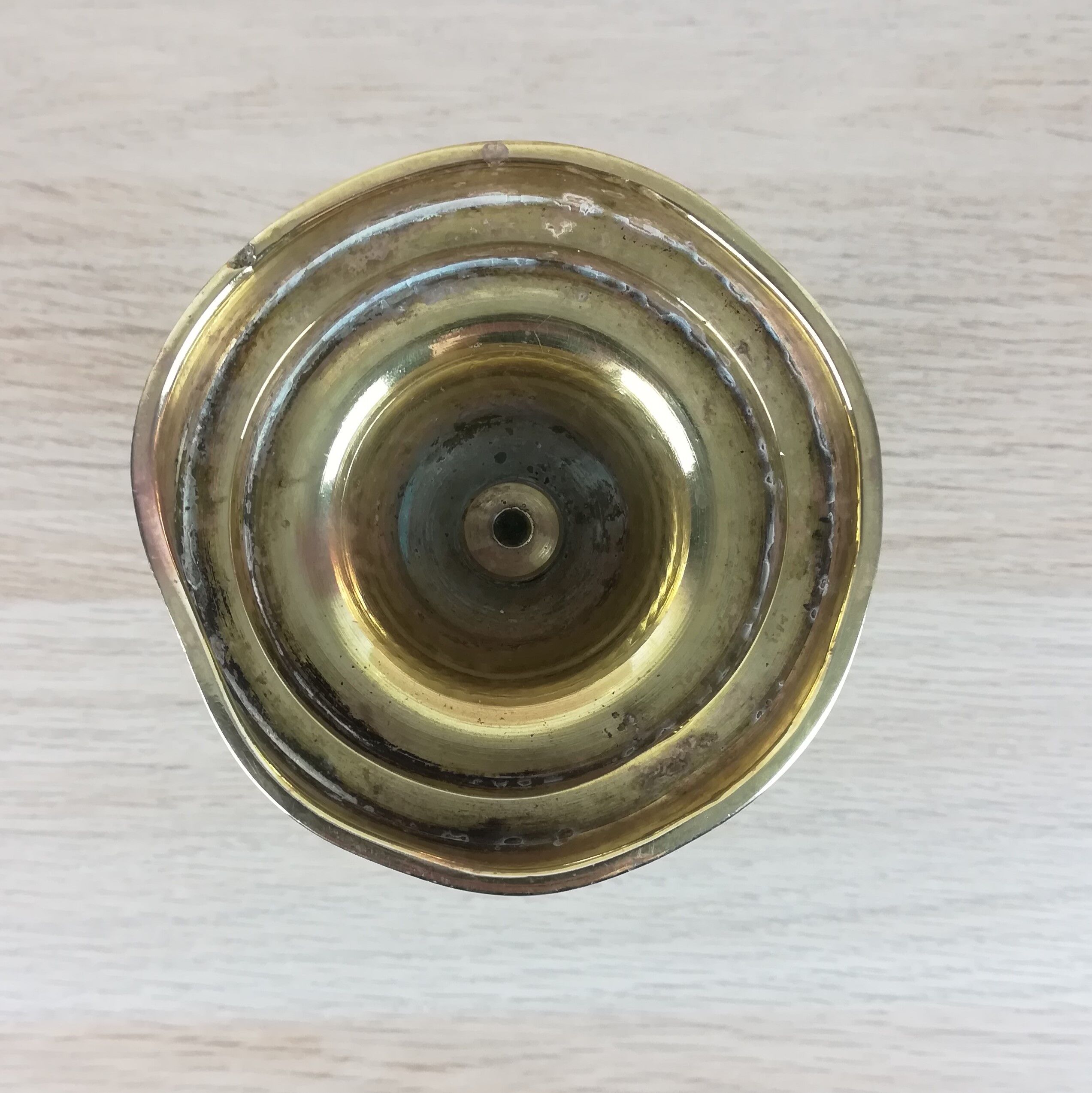 Brass pusher candle holder