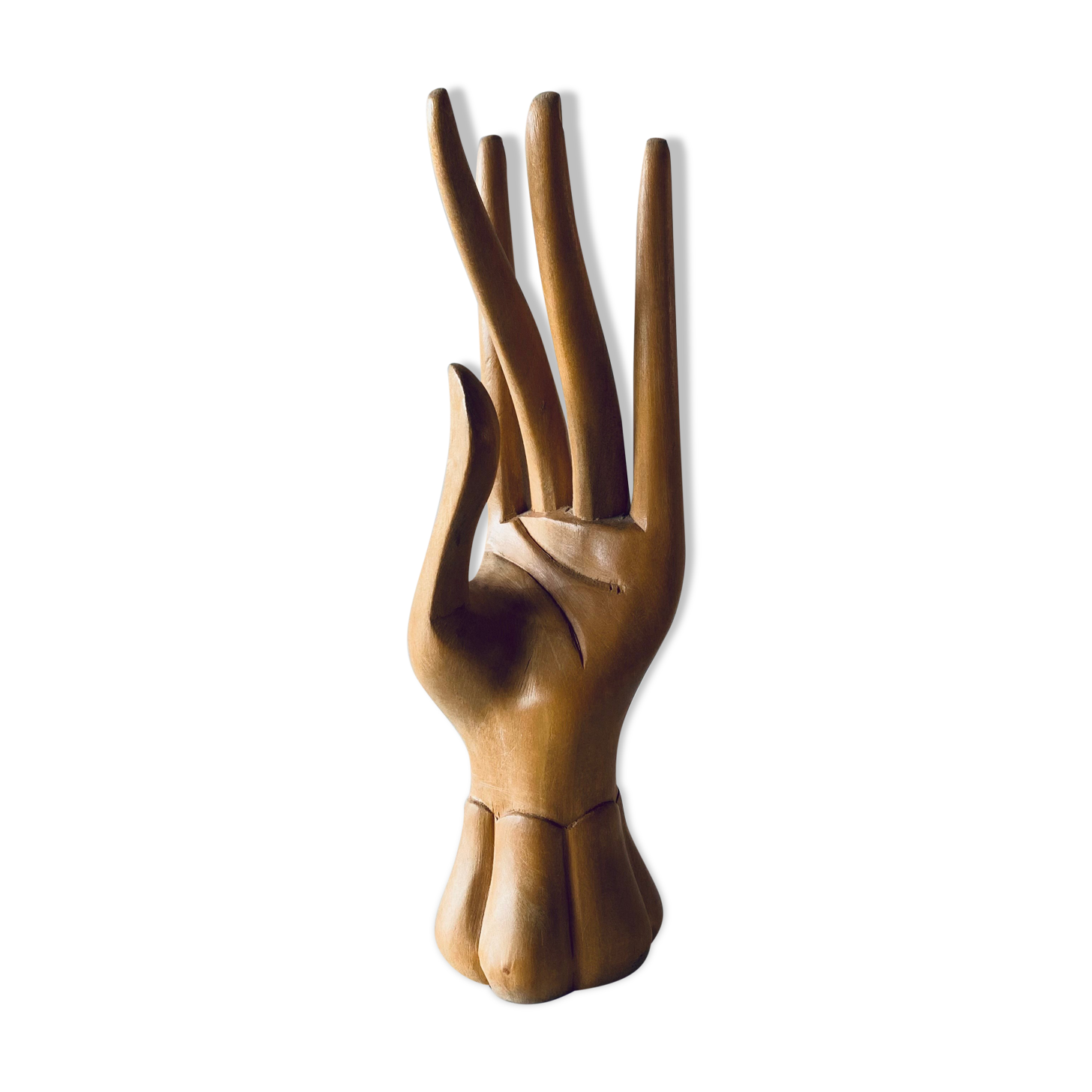 Decorative hand in carved wood