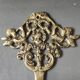 Putti musicians coat hook