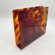 Lucite magazine rack "tortoiseshell", 1970s