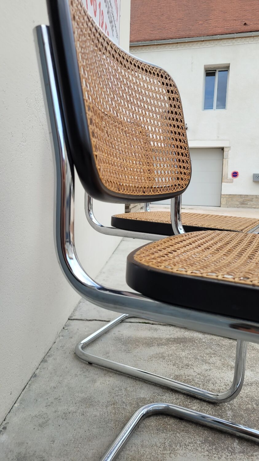 Pair of chairs by Marcel Breuer in black canework model B32 signed Italy