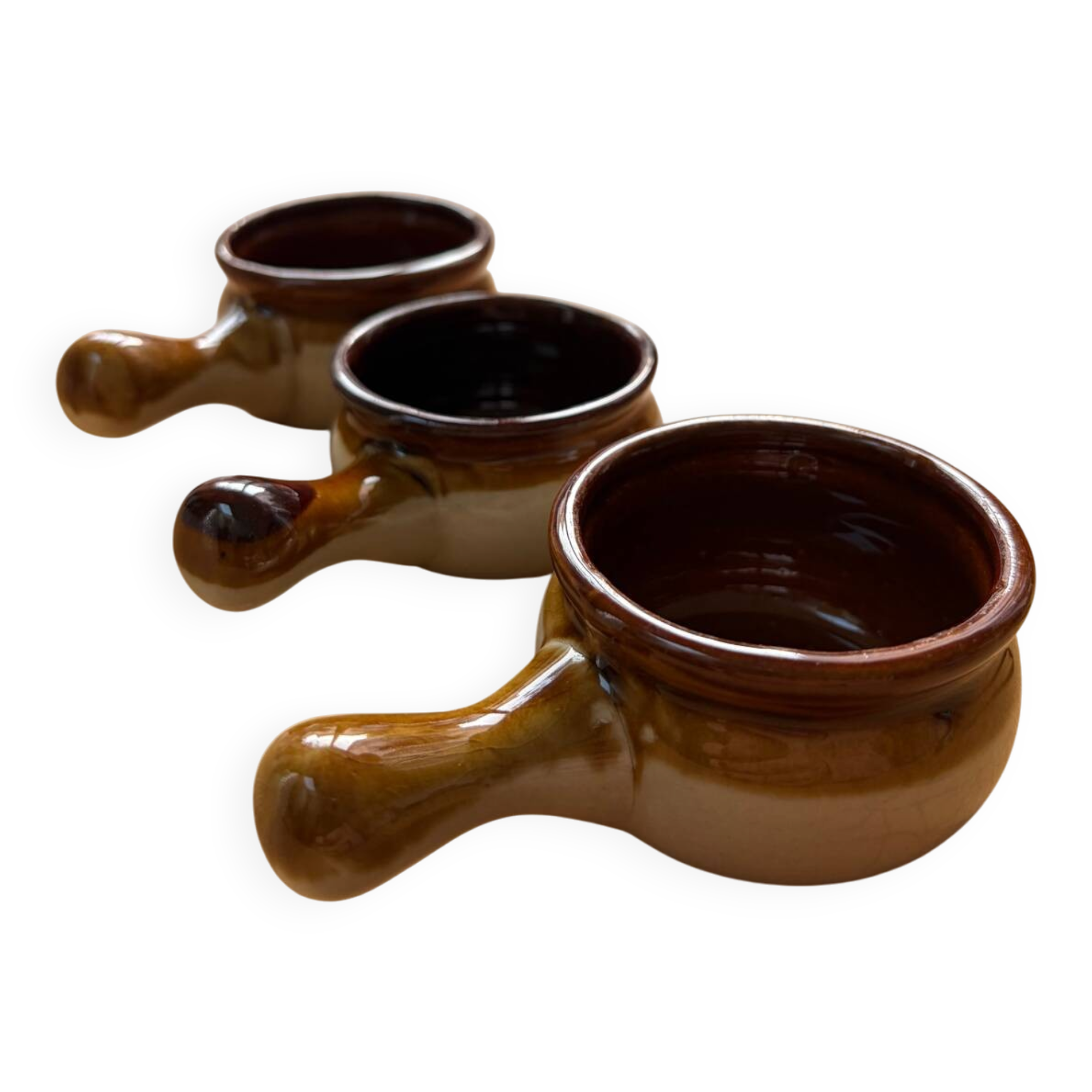 Set of 3 small glazed stoneware ramekins.
