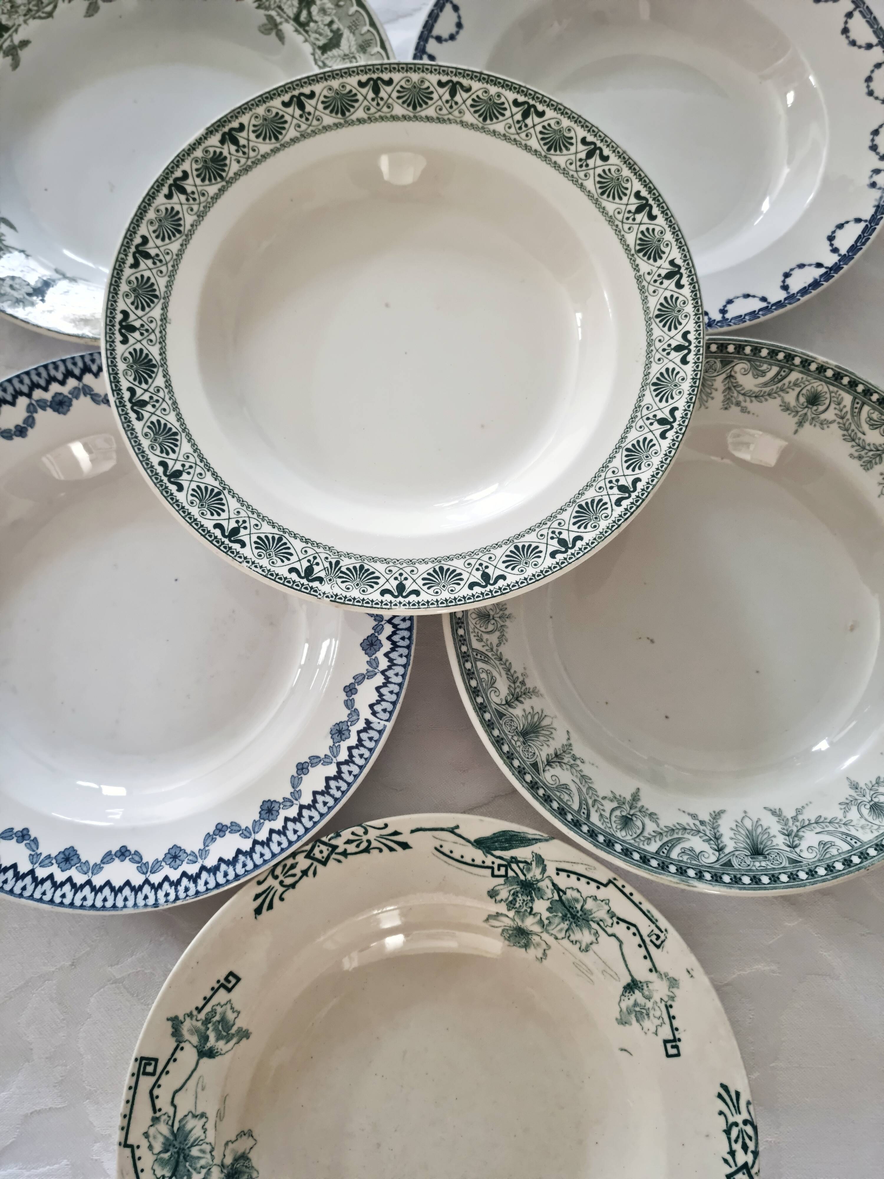 Set of 6 hollow plates earth of iron mismatched