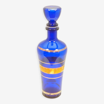 Blue glass decanter with gold decoration