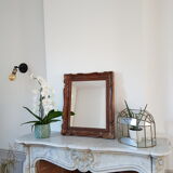 Carved wooden mirror