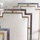 Suite de 6 fauteuils en inox et laiton