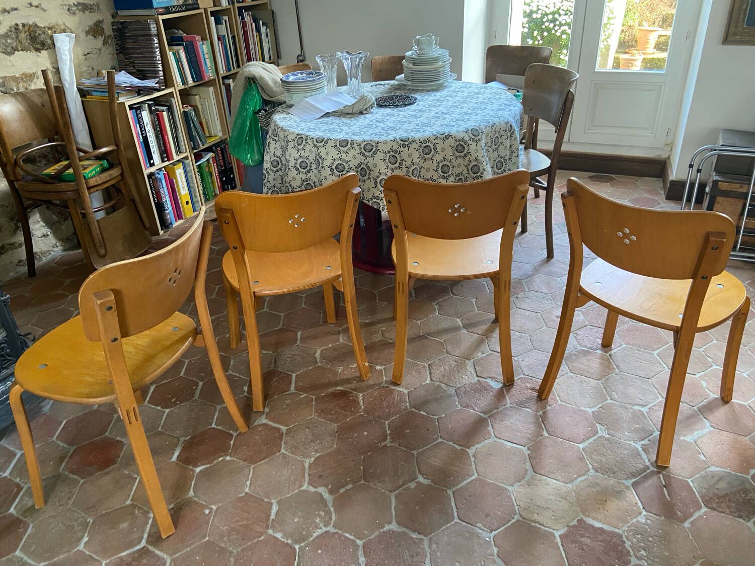 Set of 4 light wood chairs from the 1960s.