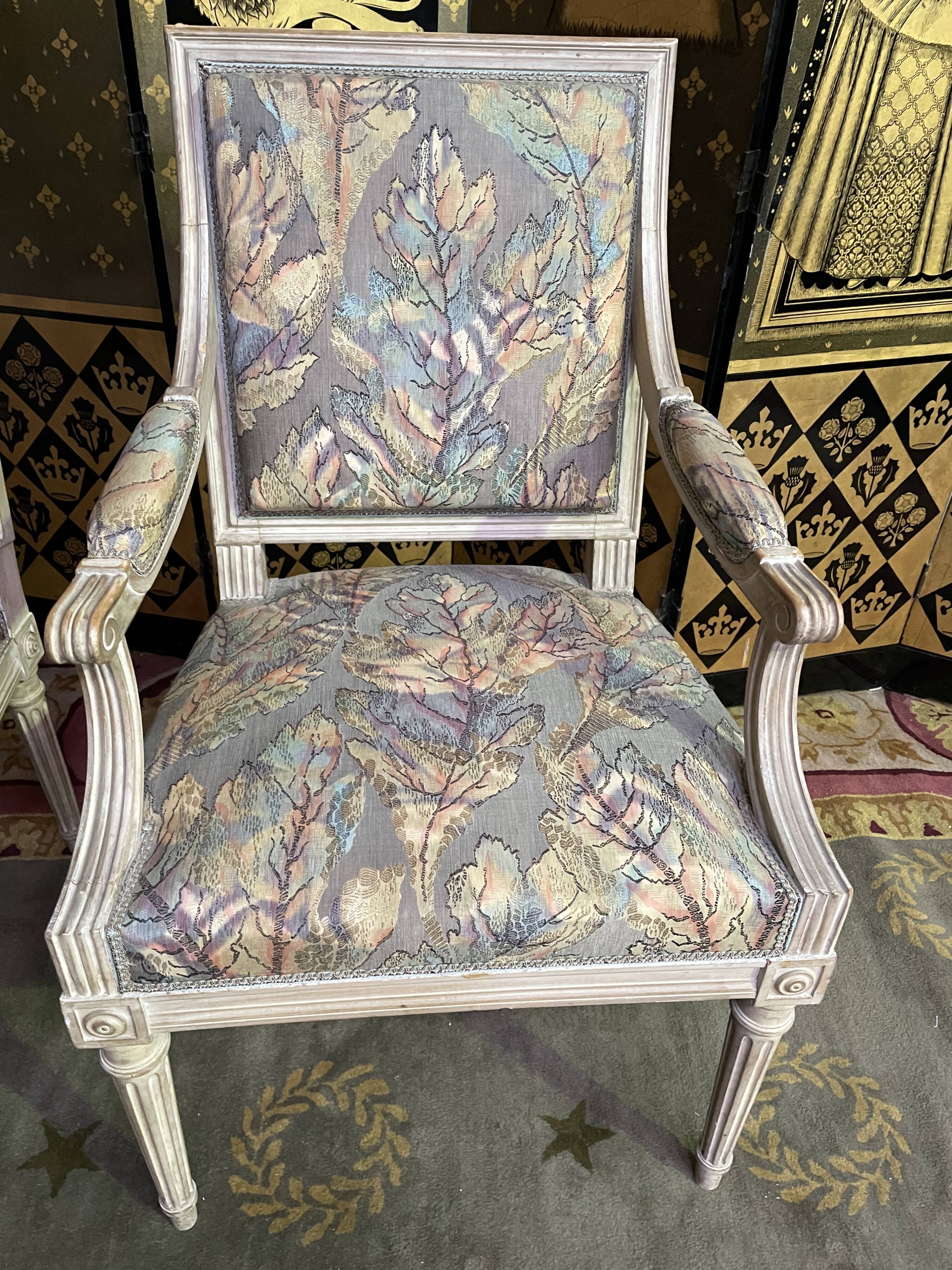 Pair of Louis XVI style convertible armchairs