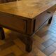 Solid oak coffee table in the style of a maie.