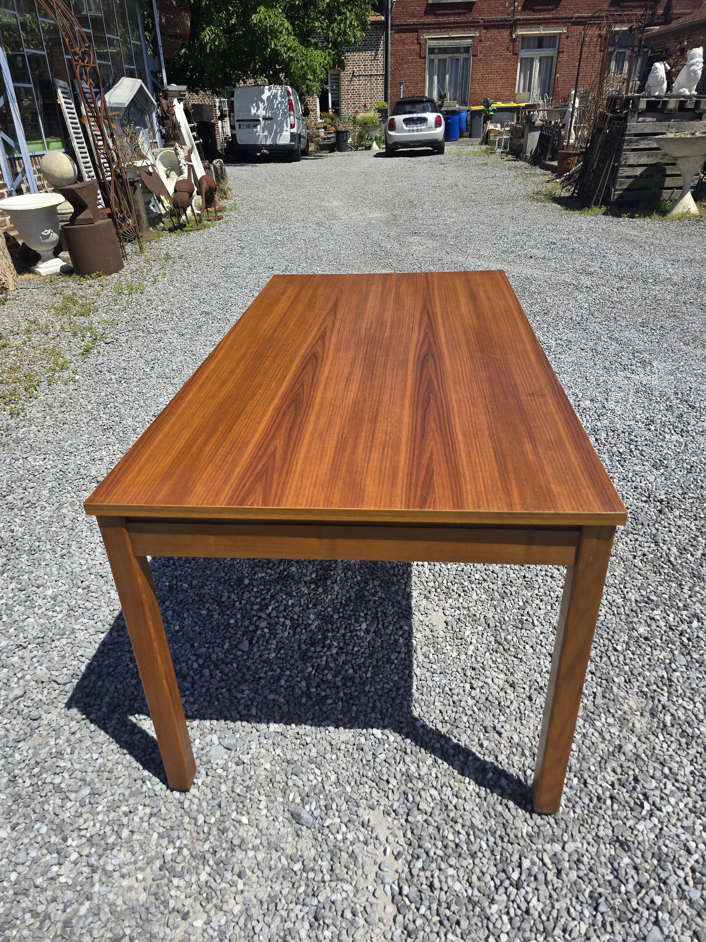 Scandinavian extendable teak table from the 60s