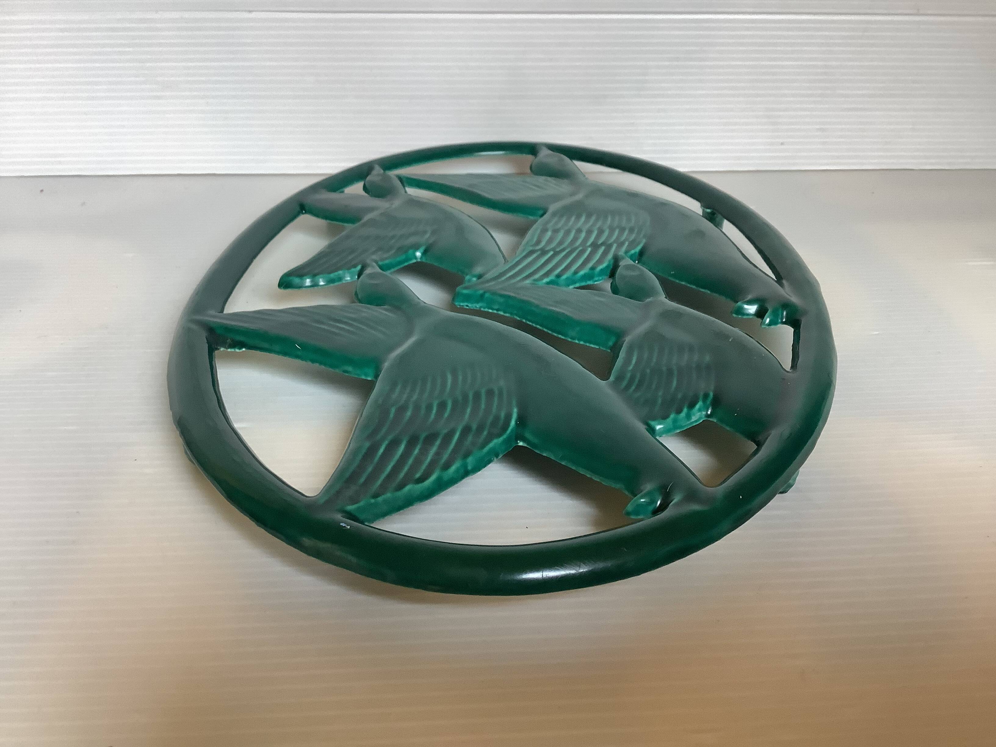 Zoomorphic enameled cast iron trivet