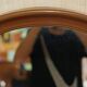 Vintage Art Deco decorative mirror with a thick frame.