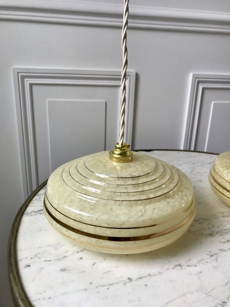 Pair of suspensions in yellow Clichy glass and golden border 40s-50s