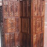 Carved solid wood screen.