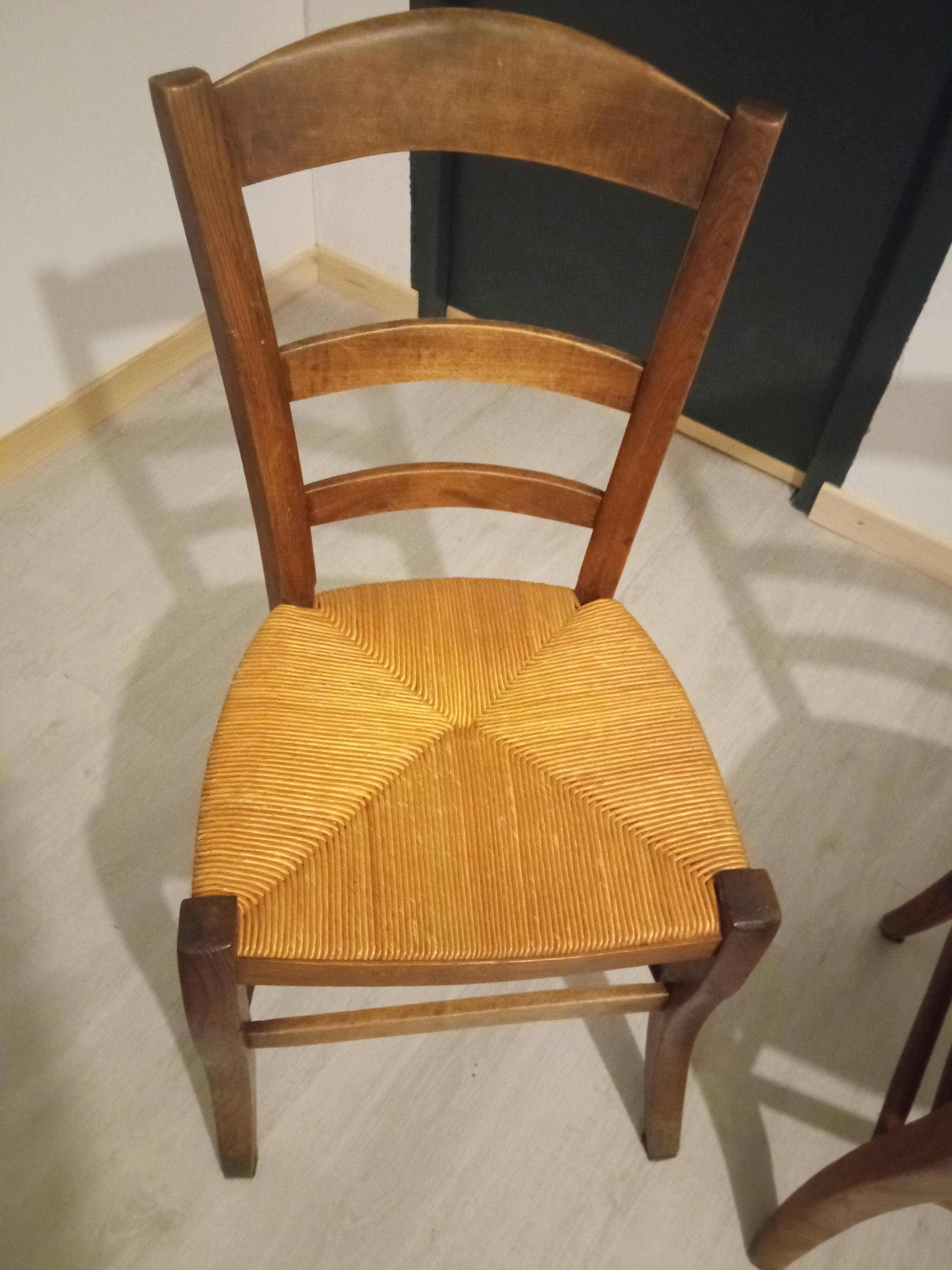 Pair of vintage wooden and woven straw chairs