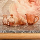 Pink glass liquor service and its accessories from the 1950s