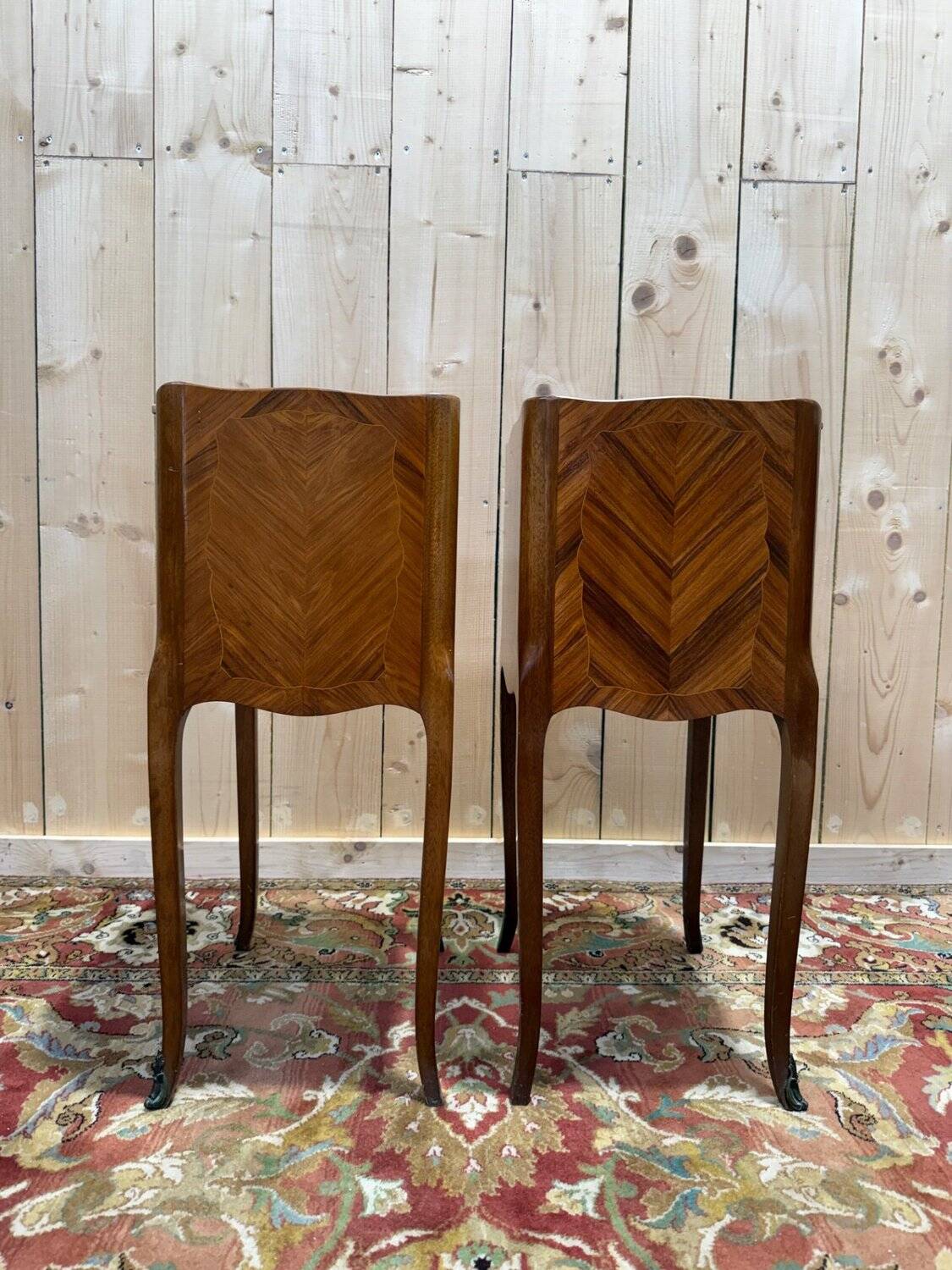 Pair of Louis XV style bedside tables in marquetry.