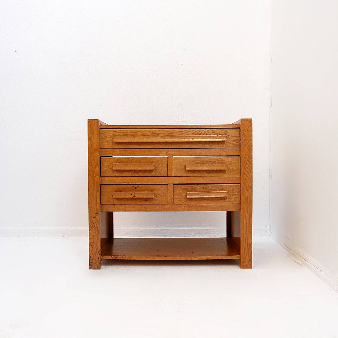1960s wooden sewing cabinet with double-sided drawers