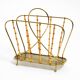 Rare Mid Century Modern magazine rack made of solid brass and genuine bambo