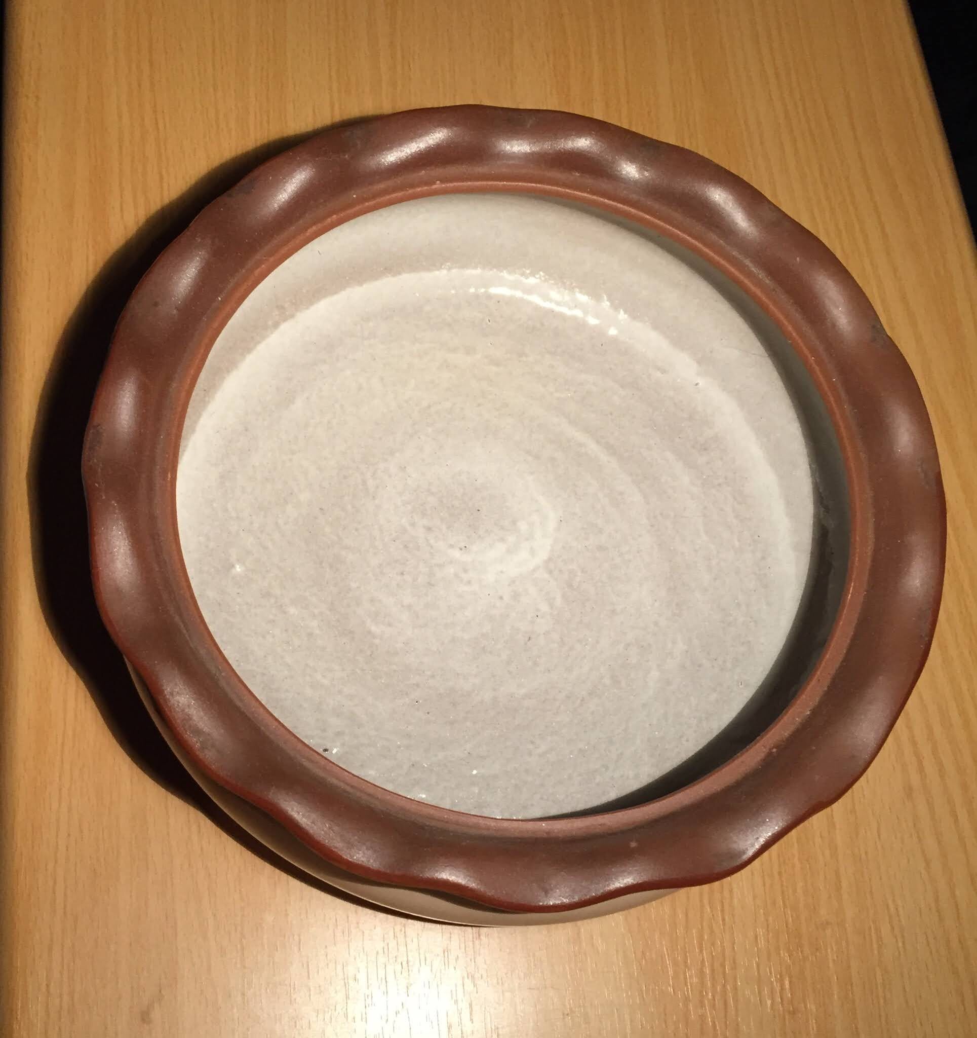 Bouillabaisse dish in terracotta fish decoration