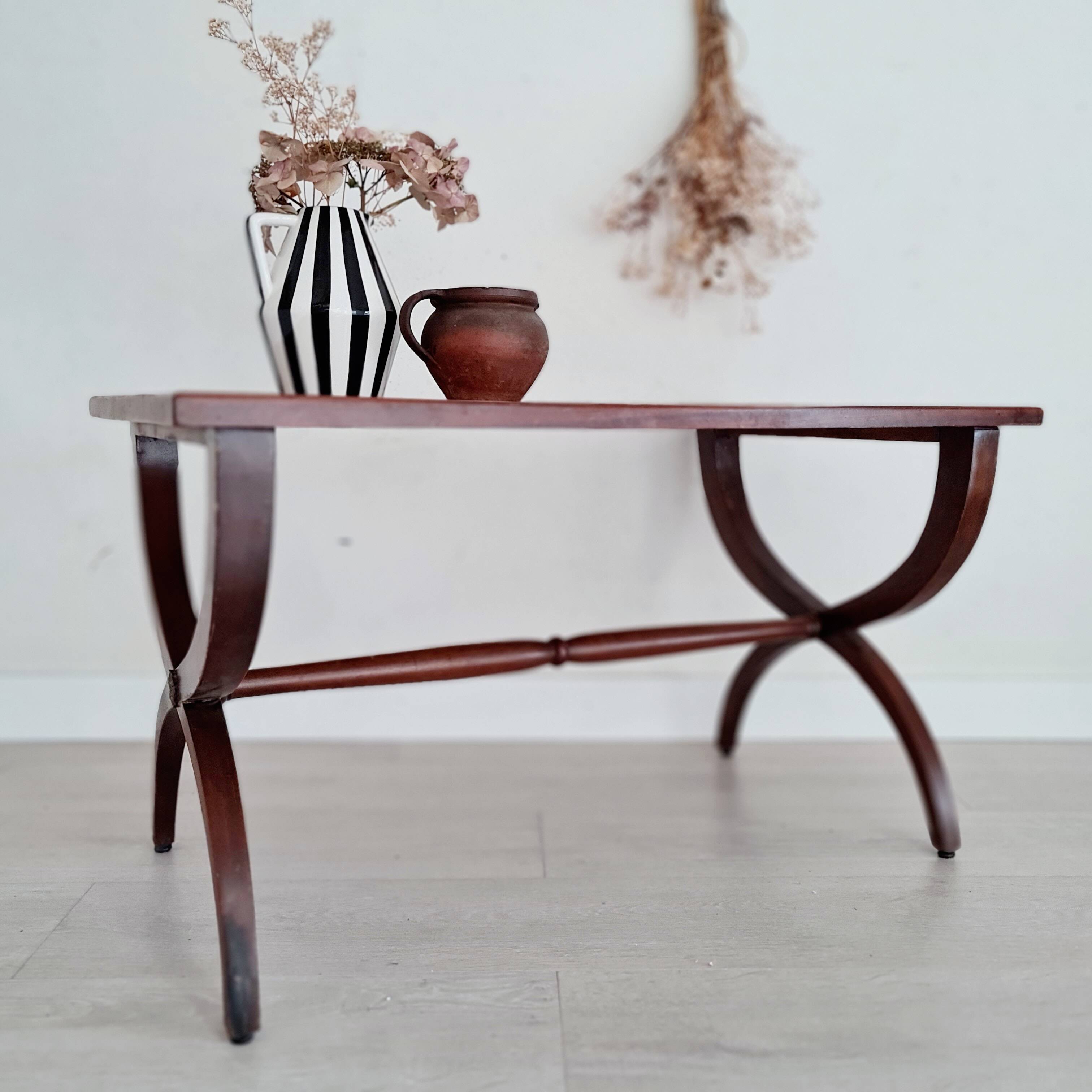 Old wooden coffee table - crossed base
