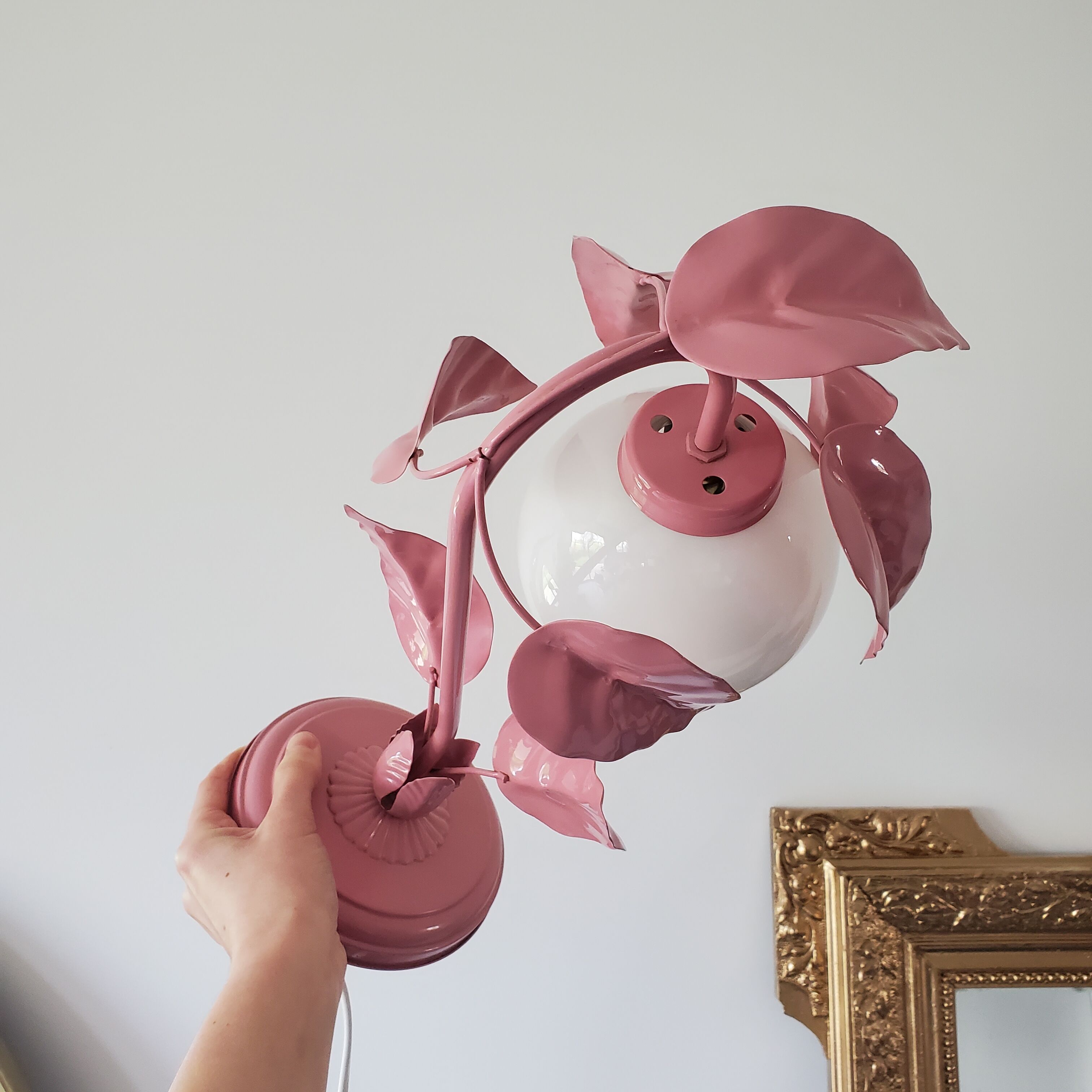 Opaline bedside lamp and pink leaves