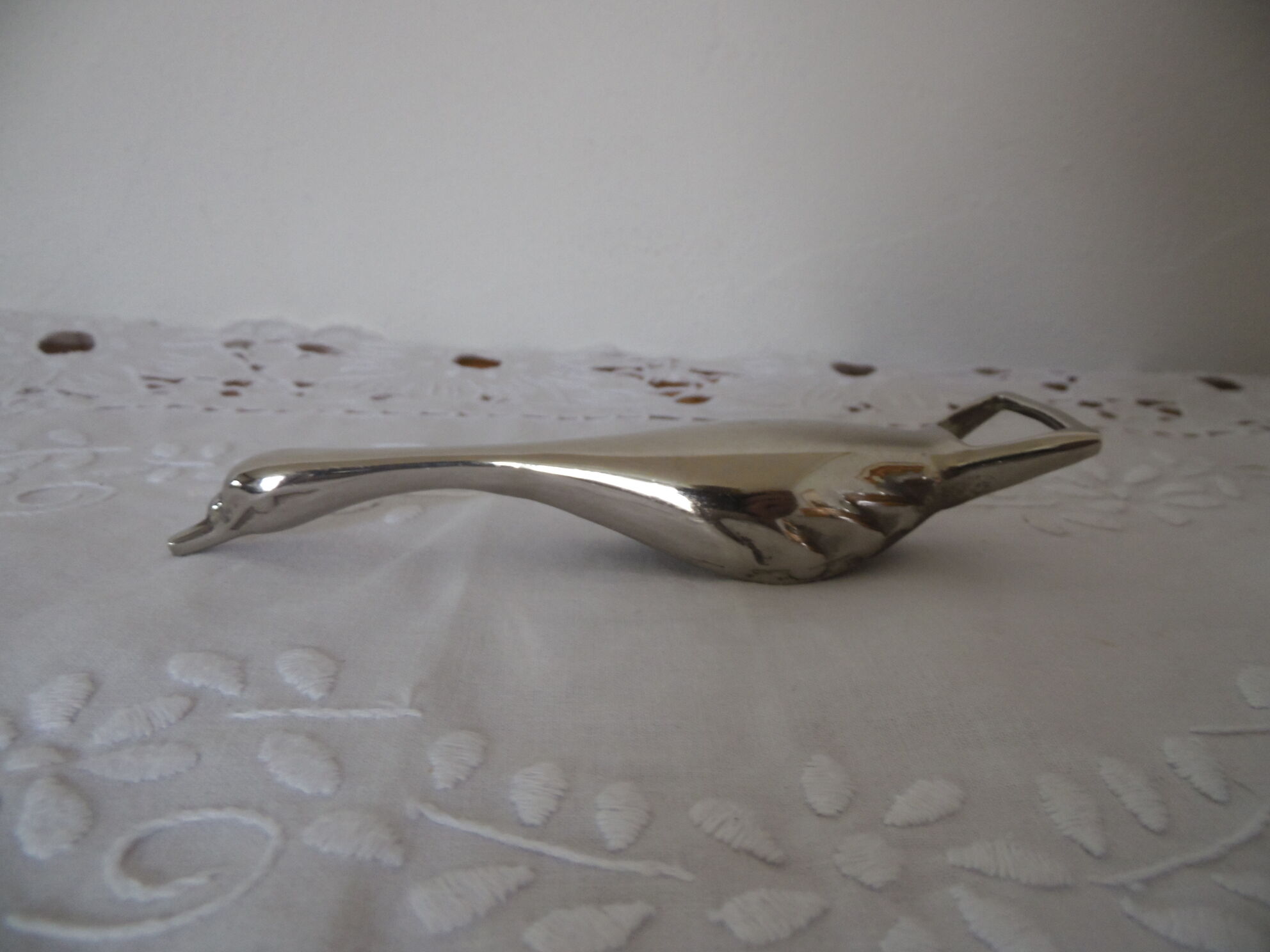 Open bottle silver metal goose