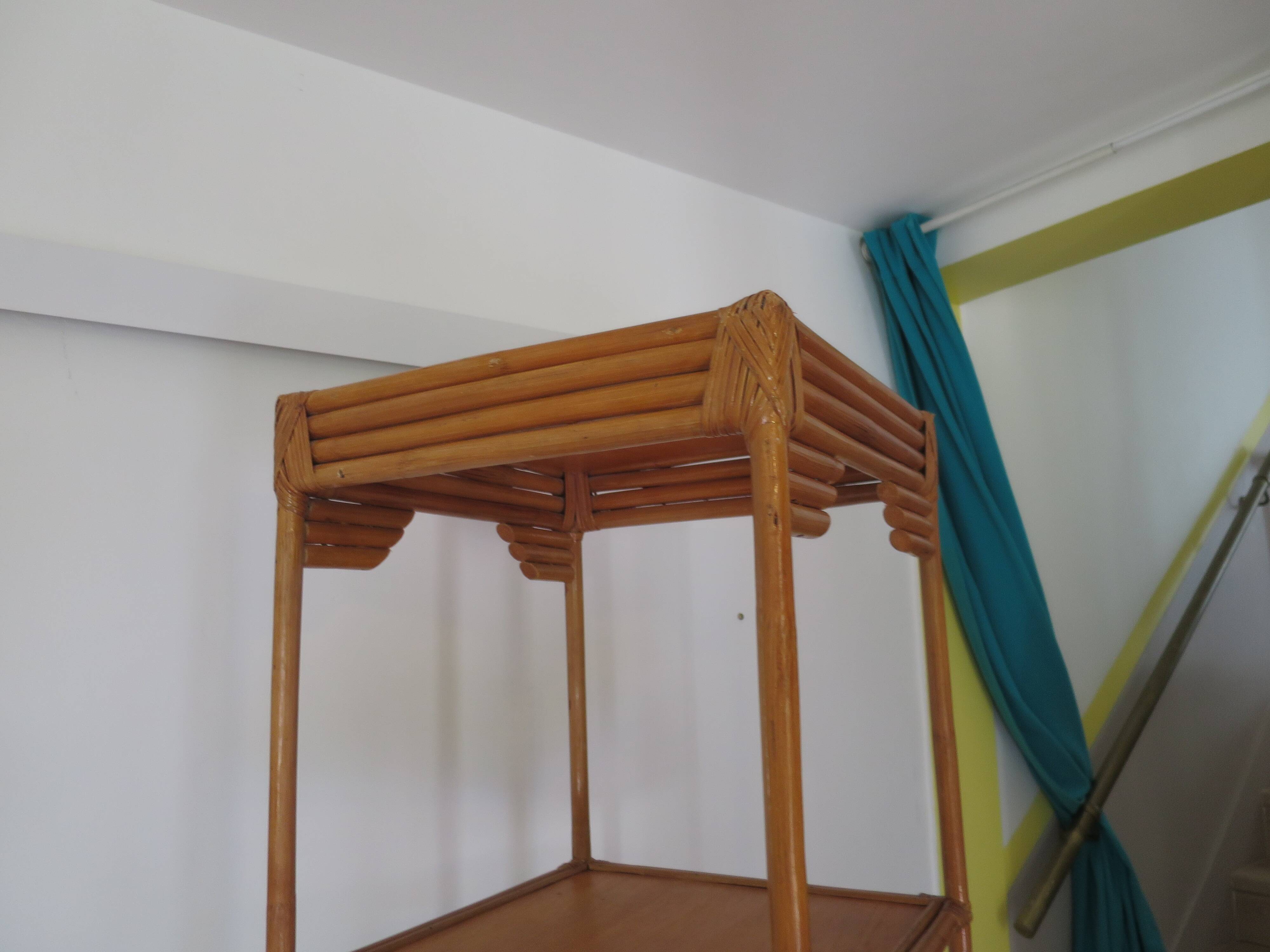 Storage column, wooden bookshelf and woven rattan.
