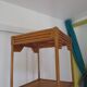 Storage column, wooden bookshelf and woven rattan.