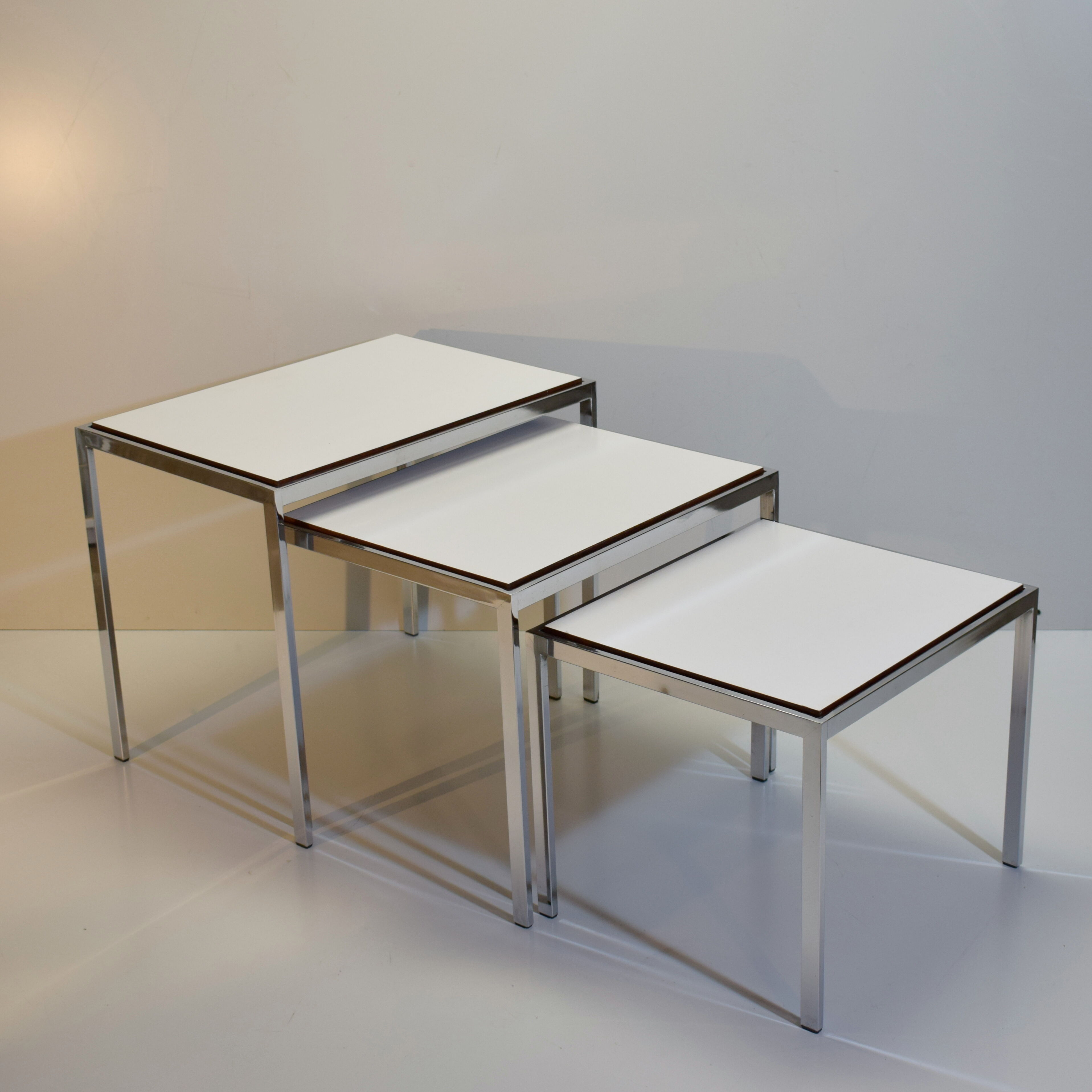 Vintage rosewood and chrome tables with reversible trays