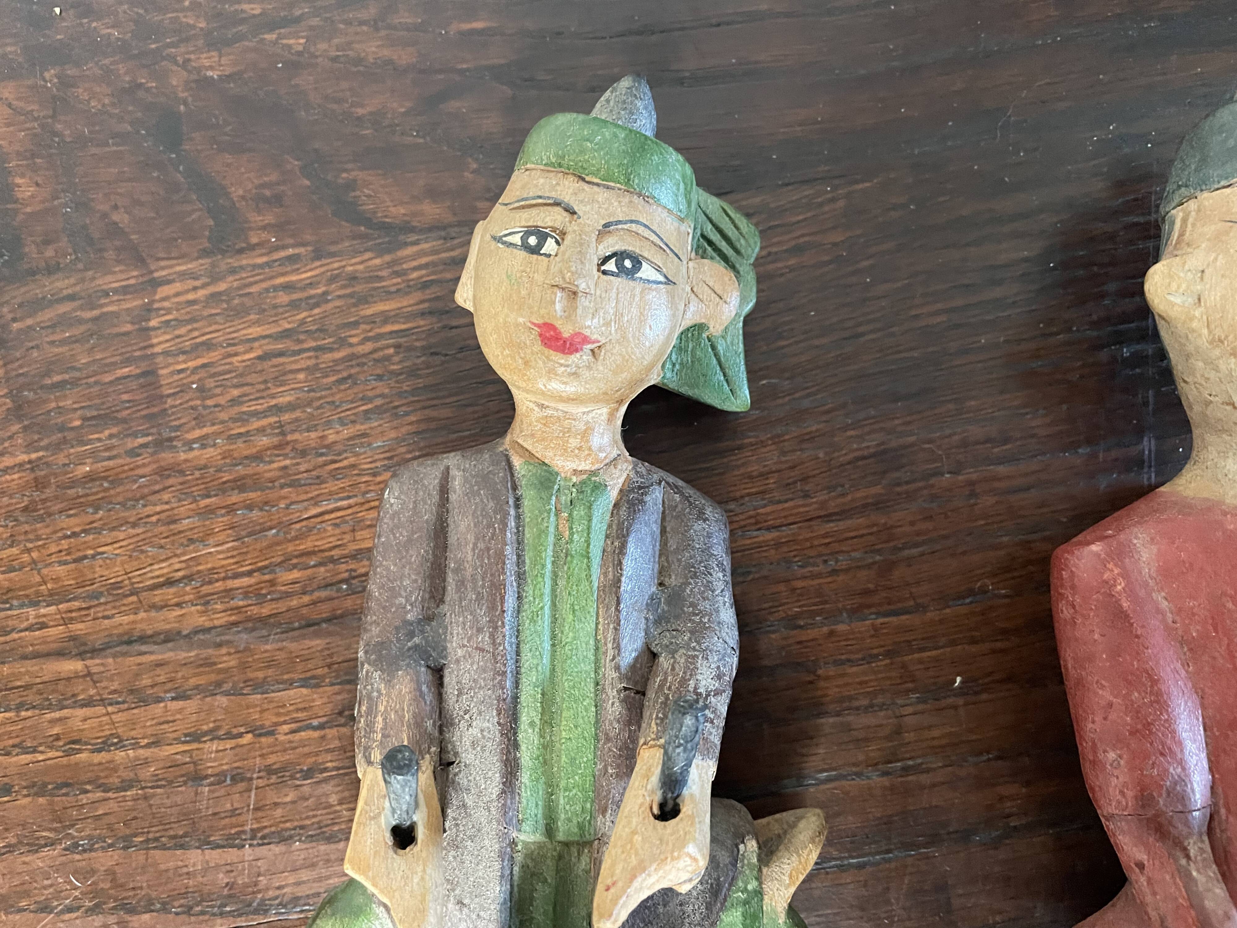 Polychrome wooden statuettes musicians from Asia